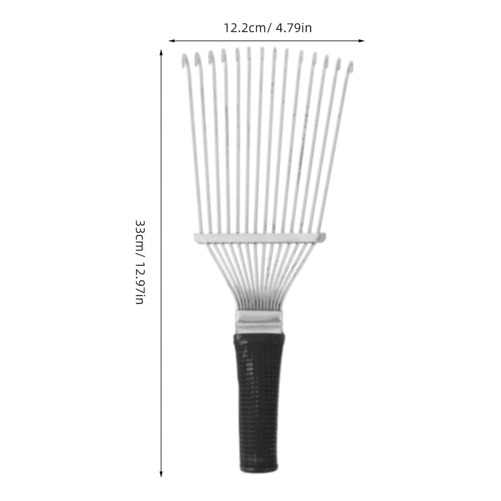 Stainless steel dematting brush rake for grooming horses and pets on a wooden surface.
