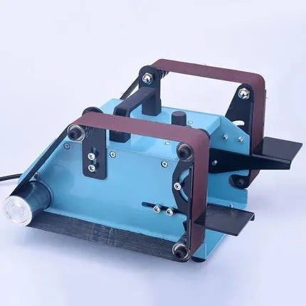 Blue desktop dual-axis belt sander with abrasive belt for sharpening and polishing tasks