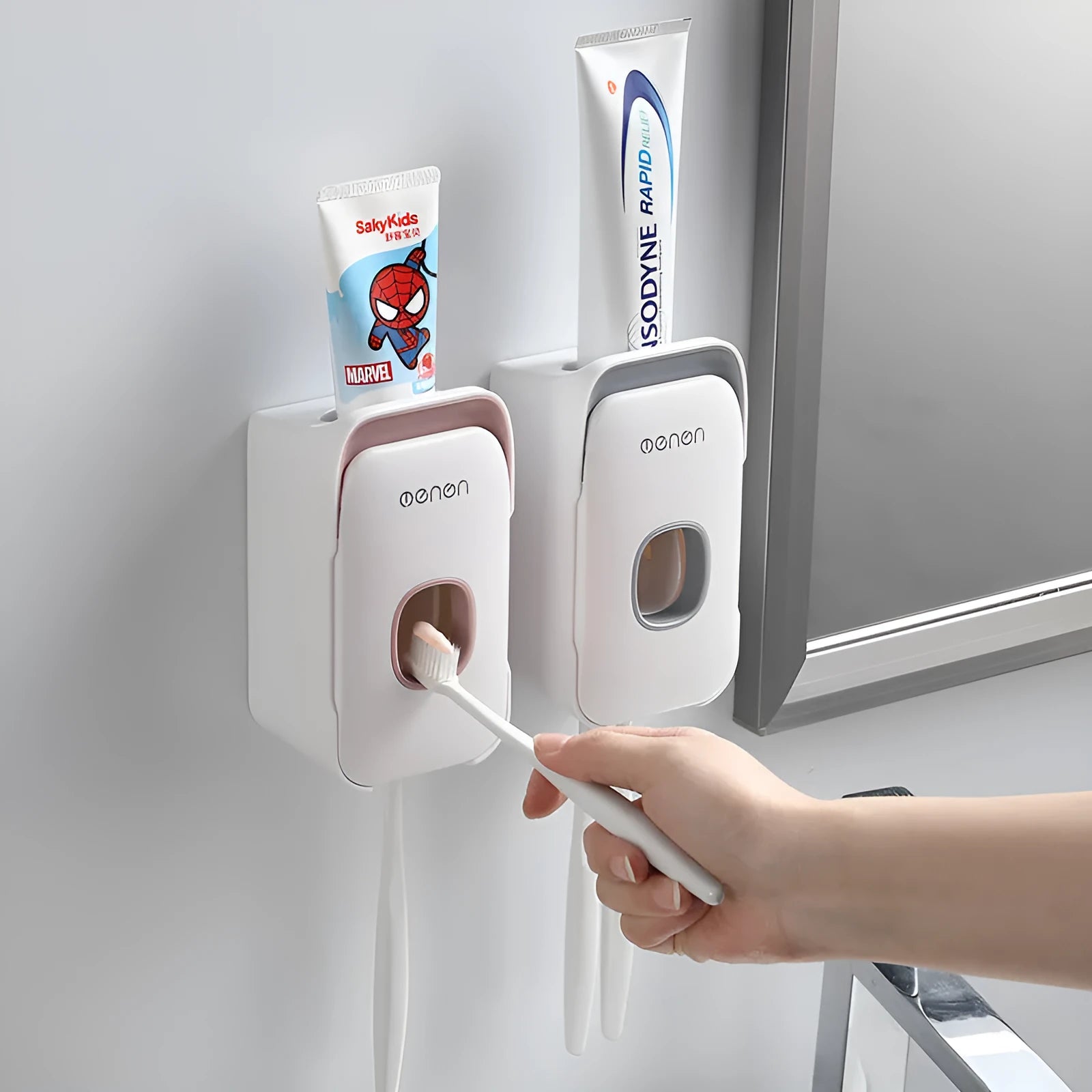 Automatic toothpaste dispenser wall unit in blue, grey or pink ABS plastic