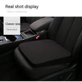 Black simple style car heightening cushion measuring approximately 42 x 39 x 6 cm on a car seat
