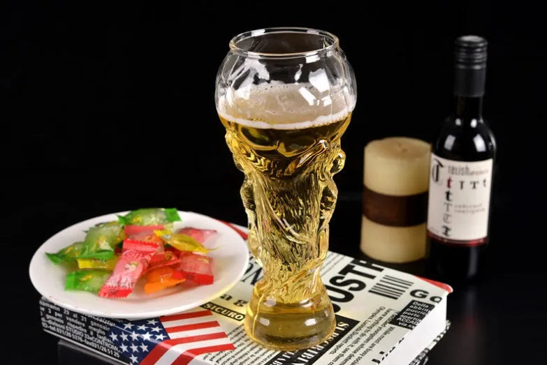 Transparent Hercules-themed glass beer cup with 450ml capacity, 6cm diameter, and 19cm height on a table