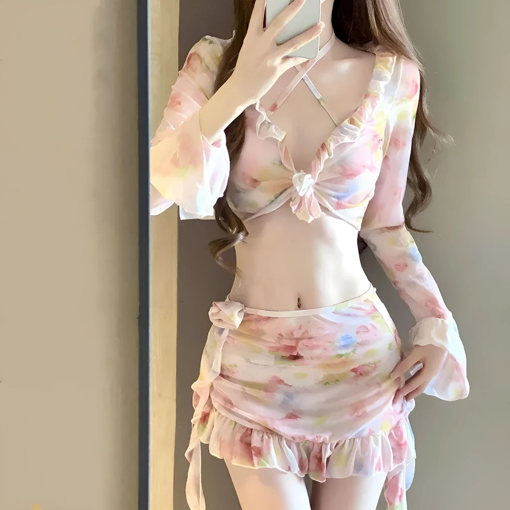 Women's floral bikini swimsuit in cherry blossom pink with adjustable straps