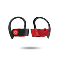 Black wireless Bluetooth earphones with ergonomic design shown on a grey background.