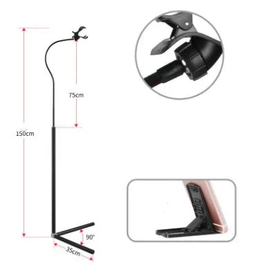 Black mobile phone bracket mounted on bed frame holding smartphone for comfortable viewing