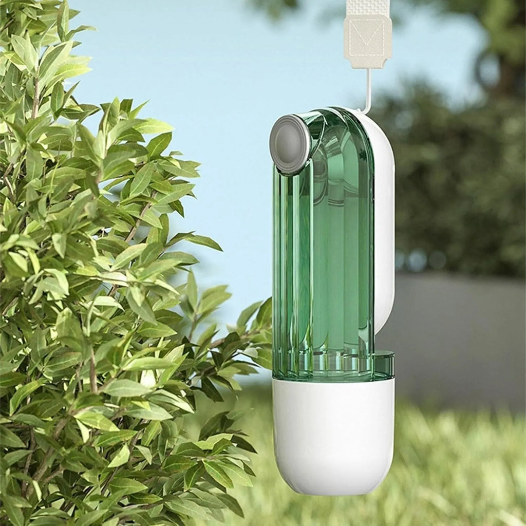 Beige foldable dog water bottle with food dispenser showing collapsible design and drinking tray