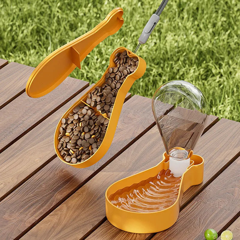 Portable 2-in-1 pet water feeder in orange with water bottle and food container compartments, shortened sling for carrying