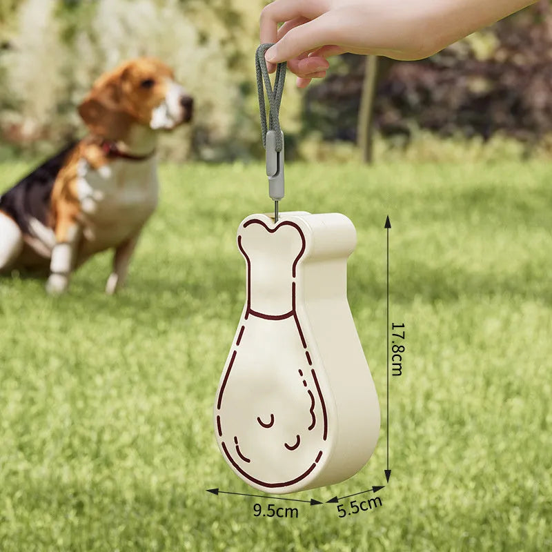 Portable 2-in-1 pet water feeder in orange with water bottle and food container compartments, shortened sling for carrying