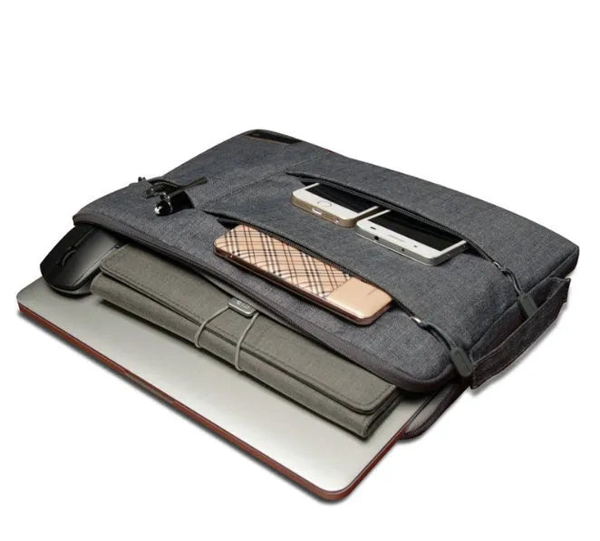 Shockproof portable laptop case in black nylon with zipper closure and interior pockets, fits 15.6 inch laptop