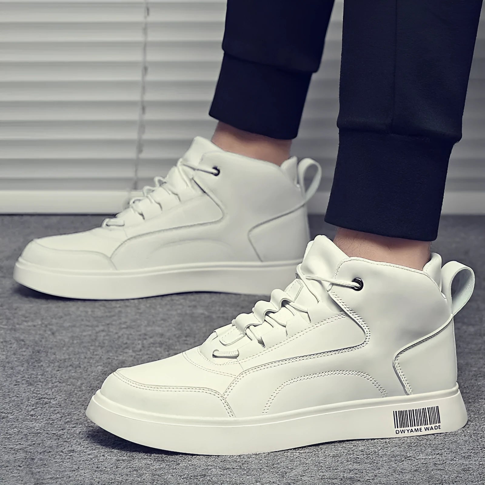 Men's white casual mid-top board shoes with round toe, lace-up front, and low-profile rubber sole.