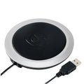 USB heating coaster in PU artificial leather on a desk with a coffee cup, available in black, blue, or orange