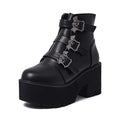 Black women's punk ankle boots with bat buckle decoration and side zip closure
