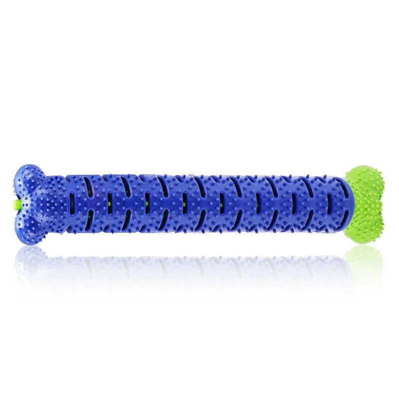 Blue silicone dog chew toy toothbrush with treat dispenser on white background