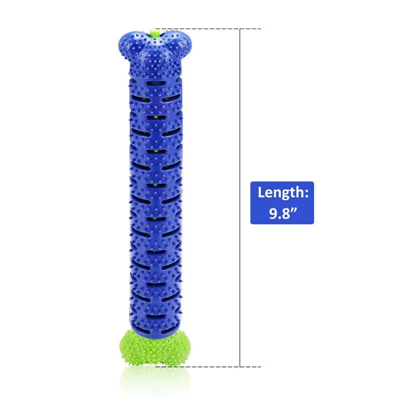 Blue silicone dog chew toy toothbrush with treat dispenser on white background