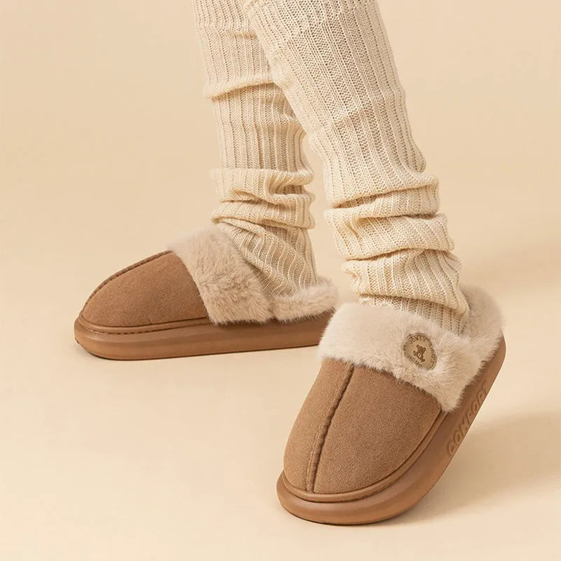 Plush winter slippers with thick PVC sole and fleece upper in various colours
