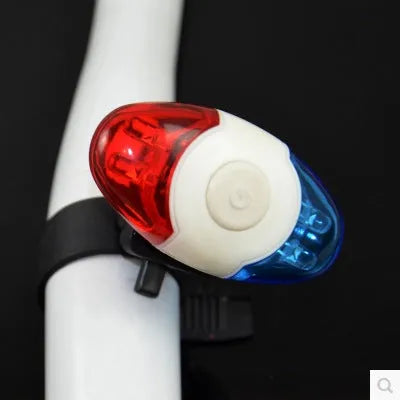 Red and blue dual-colour bicycle tail light with four LED beads on an adjustable mounting bracket.