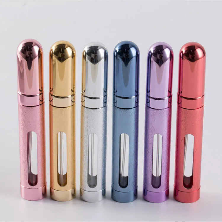 12ml aluminium portable perfume bottle atomiser in six colour options shown next to a ruler for scale.