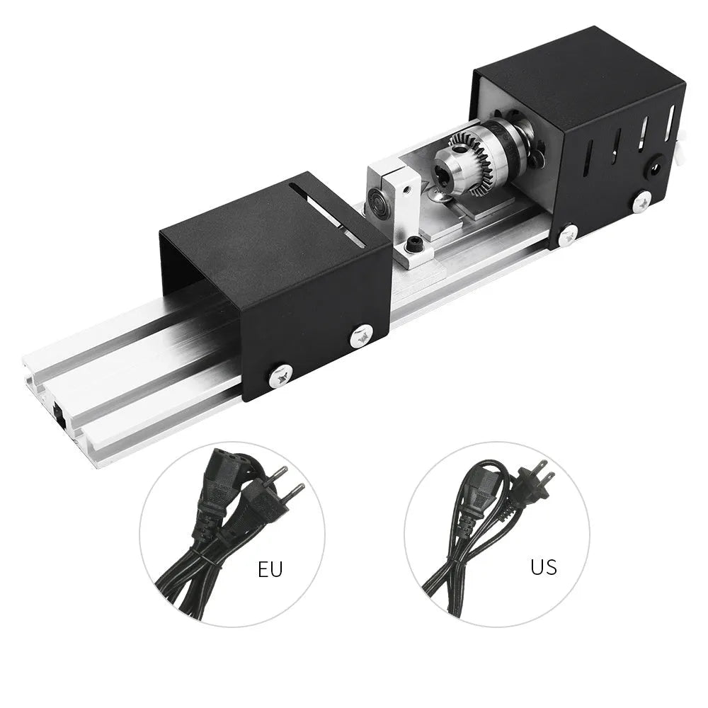 Mini silver metal woodworking lathe with carving knives on benchtop