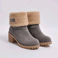 Women's suede mid-calf snow boots in black with a thick flat heel and round toe.
