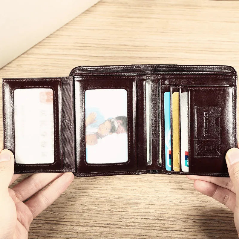 Men's leather wallet showing multiple compartments including card slots and change pocket