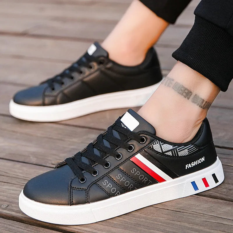 A pair of men's sports shoes shown in black, also available in grey and white, with size tags indicating 39 to 44.