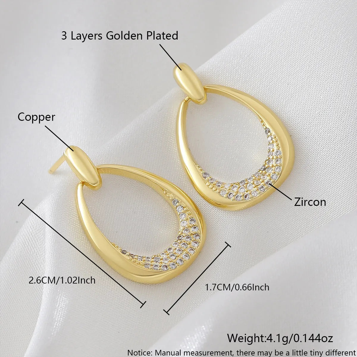 Women's yellow gold geometric drop earrings with oval rings measuring 2.6cm