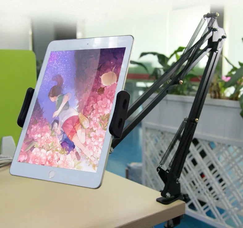Support phone tablet stand in black on a desk, holding a smartphone for hands-free viewing