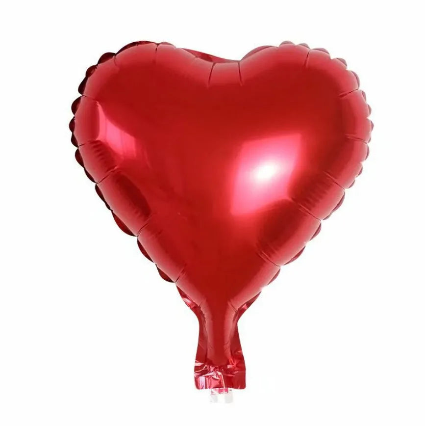 Five peach heart-shaped aluminium foil balloons in metallic colours for party decorations