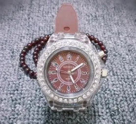 Women's LED luminous quartz watch with round dial and silicone strap in multiple colour options