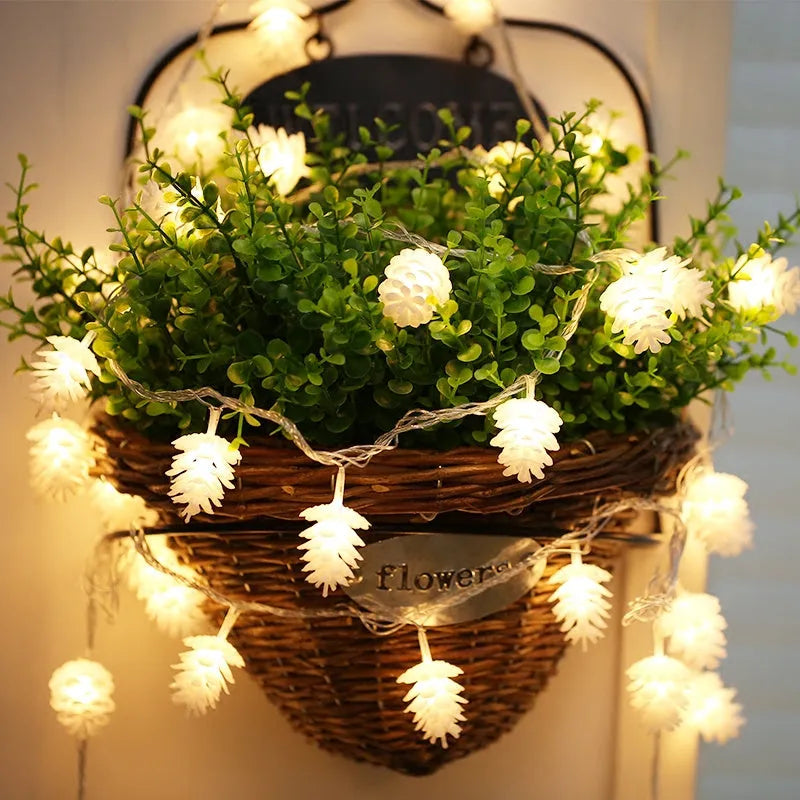 Warm white battery-powered LED pine cone light string for indoor and outdoor decoration