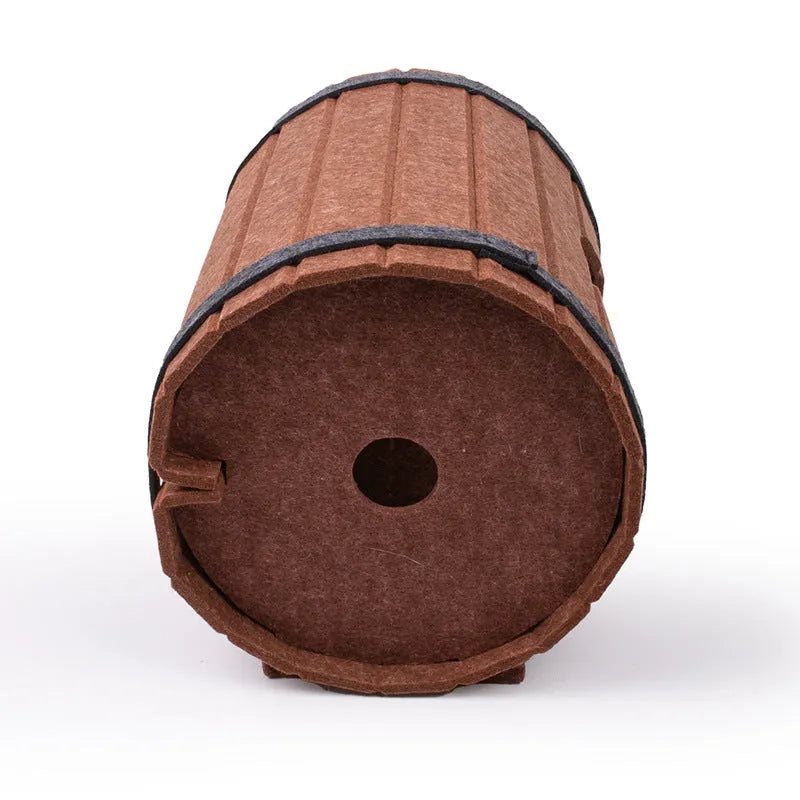 Assembled taupe and cream wine barrel shaped polyester fiber felt cat bed with three panels and two binding straps.