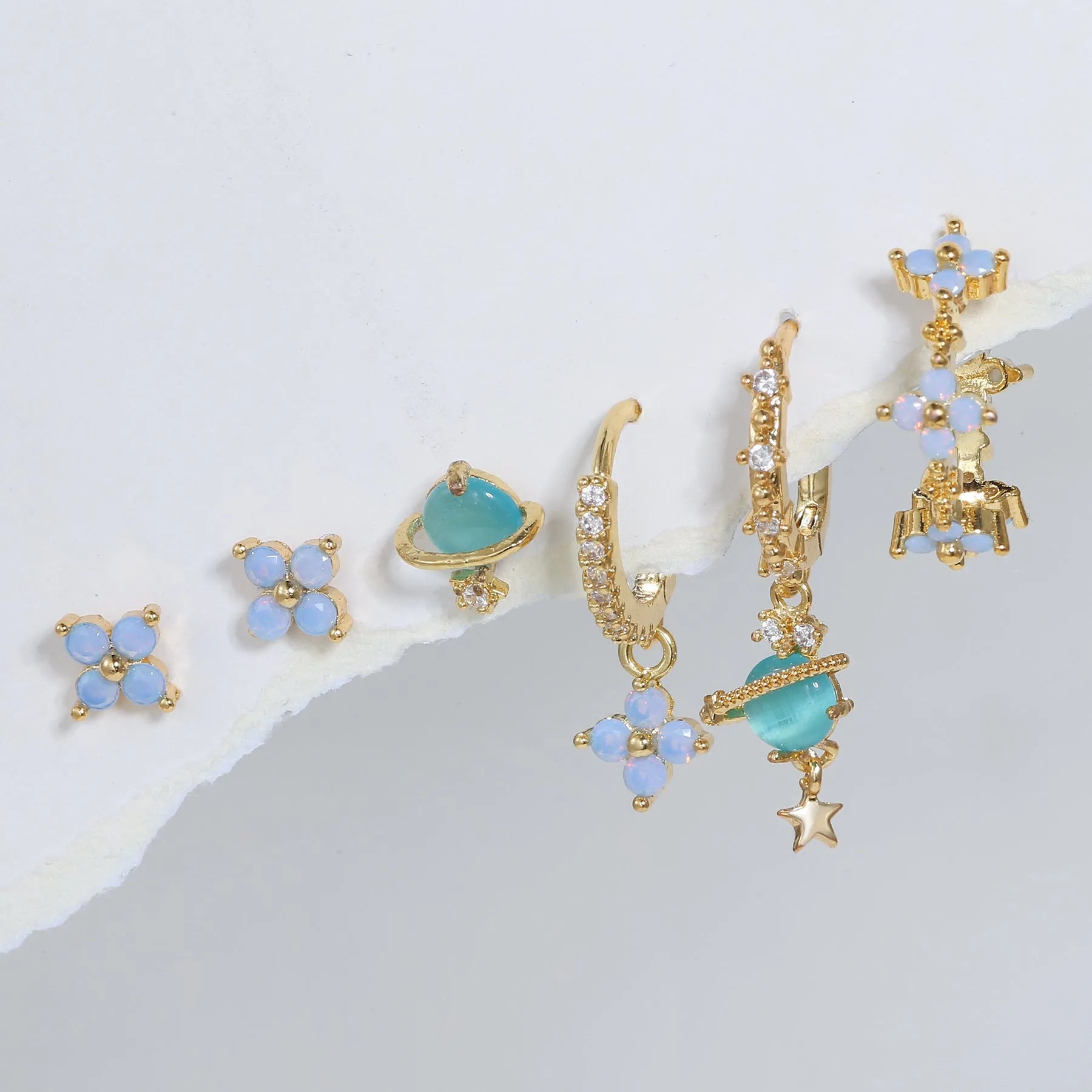 Japanese Korean style flower nail protein ear studs in gold or silver with zircon mosaic detailing