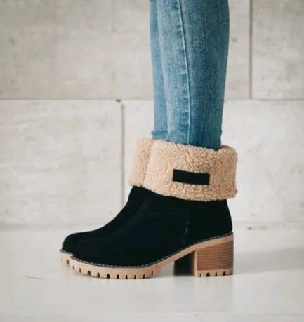 Women's suede mid-calf snow boots in black with a thick flat heel and round toe.