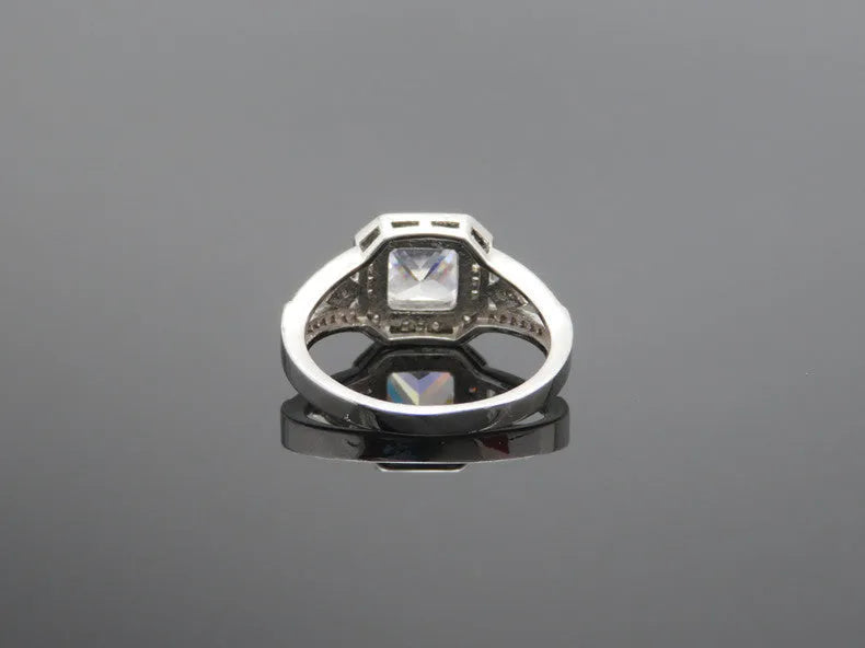 Geometric women's zircon ring with hollow design and platinum-colour finish