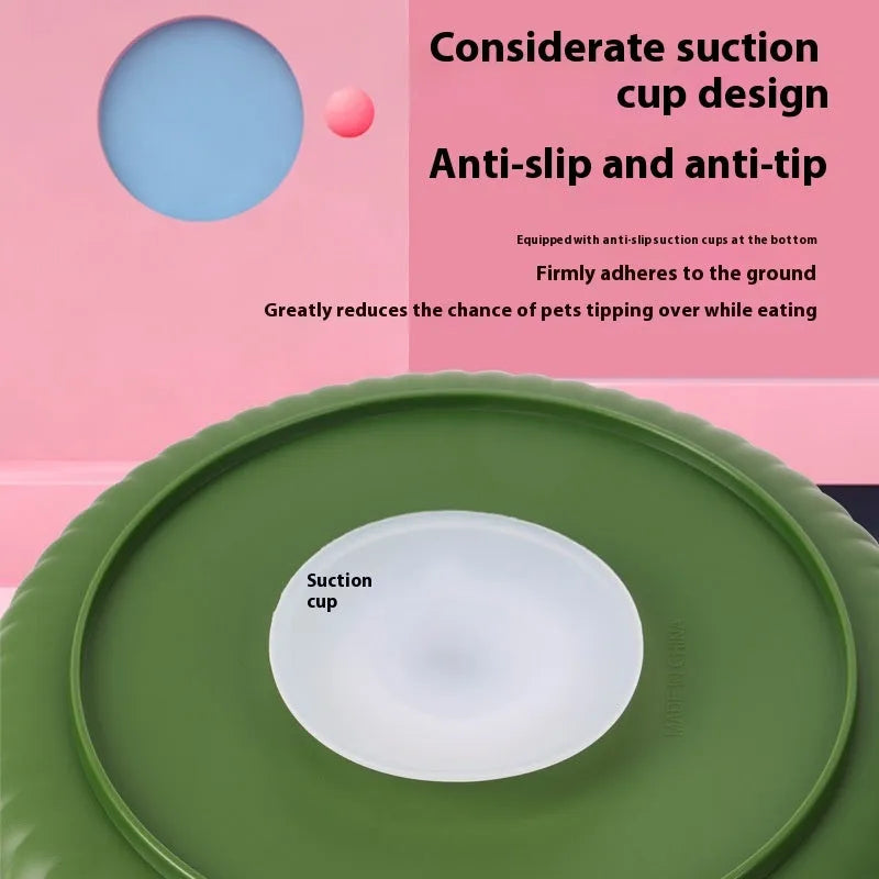 Rotating pet slow feeder bowl with silicone anti-choke pad in blue, showing game board texture.