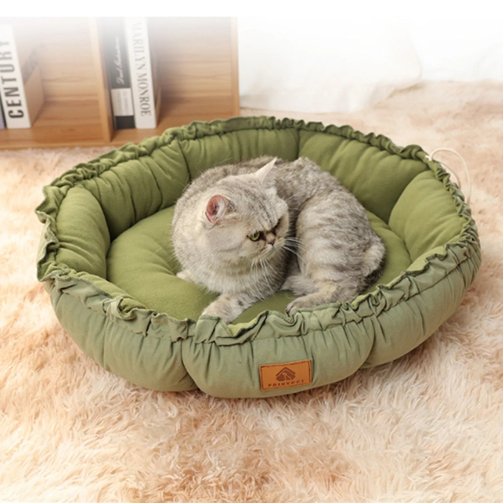 Reversible donut cat bed in grey or green available in three sizes for indoor pets