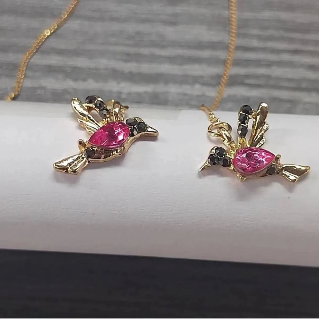 Long style women's earrings with a hanging bird design featuring mixed zirconium wings.
