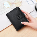 Ladies' short wallet with lychee pattern in two-fold design showing interior compartments