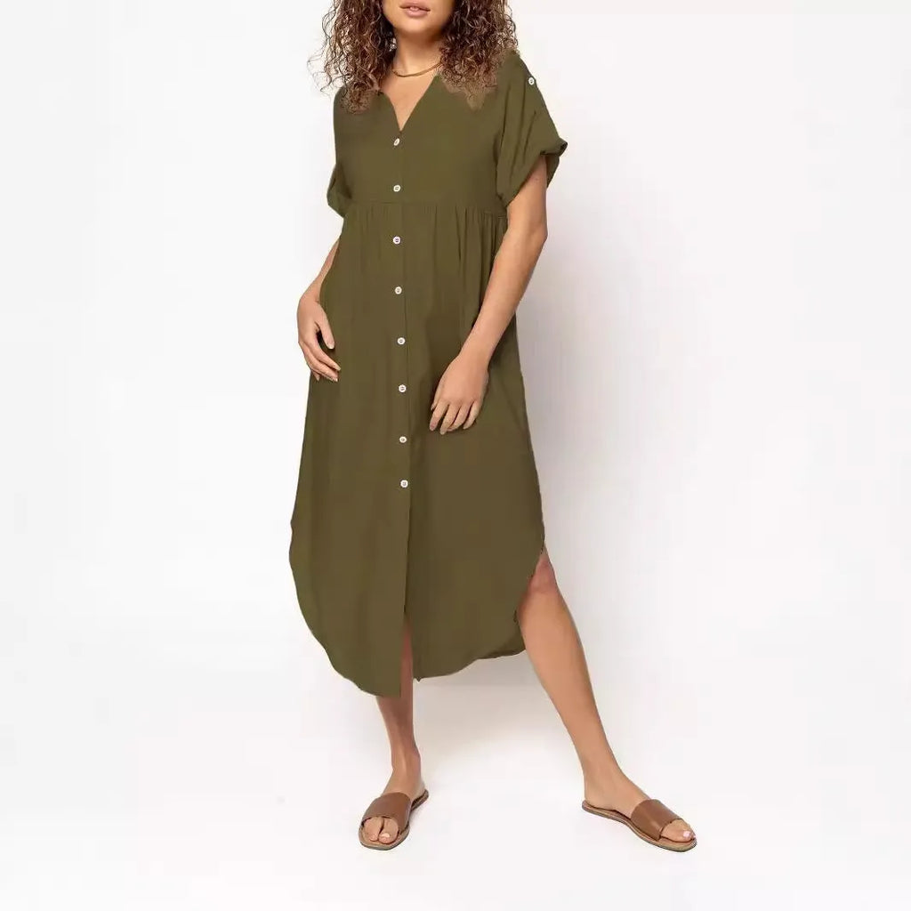 A loose-fitting, mid-length casual dress with a button-down front, shown in a solid colour.