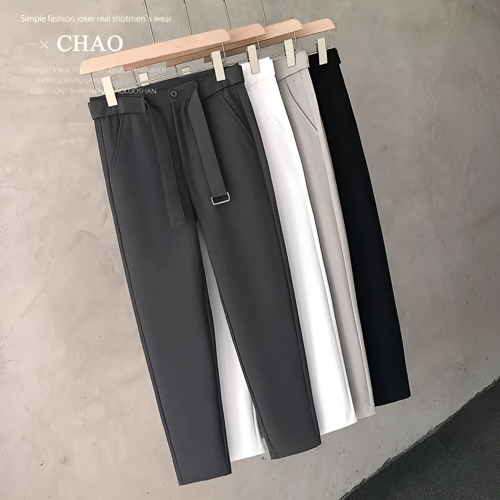 Boys slim straight wool trousers in black showing tapered cut and straight leg opening