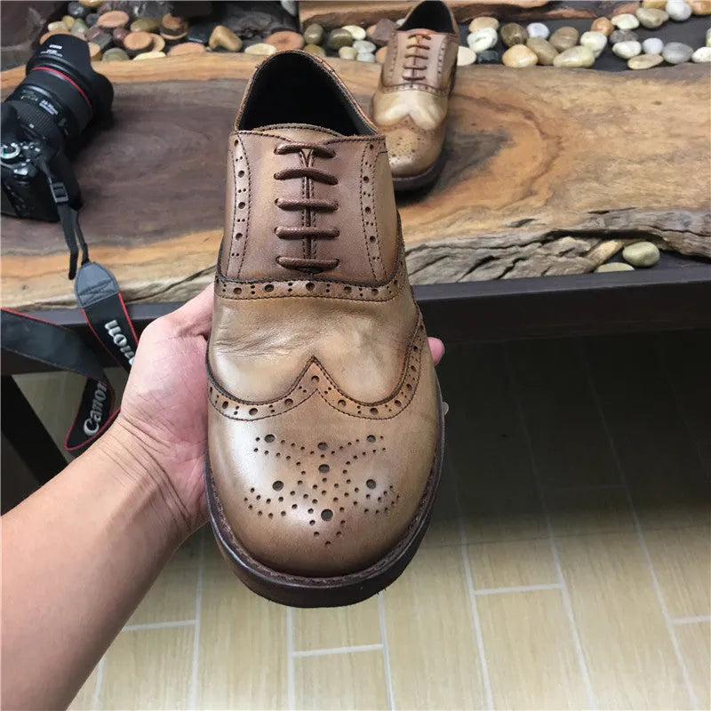 Light brown men's distressed leather casual shoes with lace-up closure and round toe.