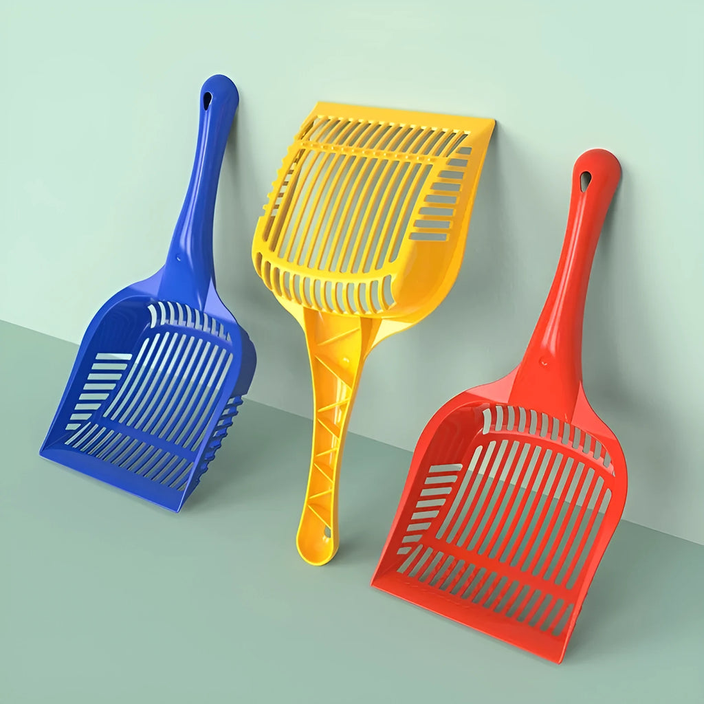 Red plastic cat litter scoop with handle next to a yellow and blue scoop, showing small and medium sizes.
