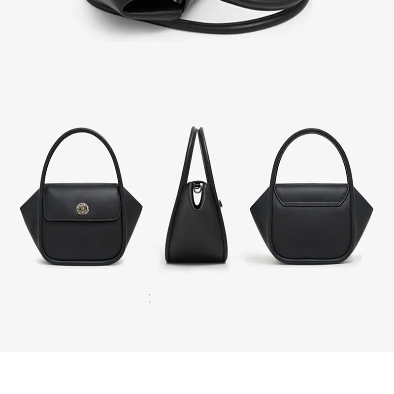 Women's wing-shaped cow leather tote handbag with a buckle closure in a choice of four colours.