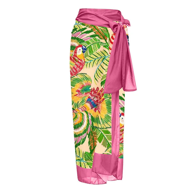 Retro pink floral print women's one-piece swimsuit with V-neck and attached thin skirt.