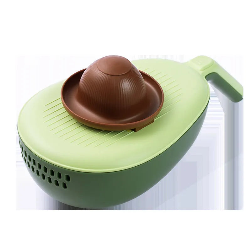Vegetable grater slicer with six sabres and bottom storage box in avocado green colour on a kitchen counter