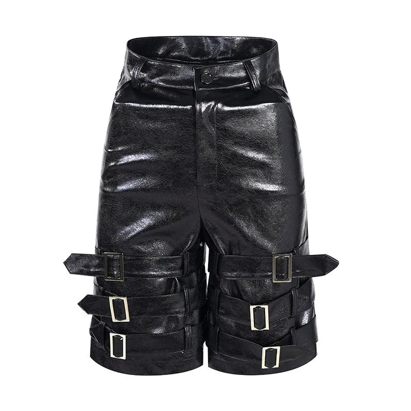 Men's black PU leather cropped shorts with leather ring details on a mannequin.