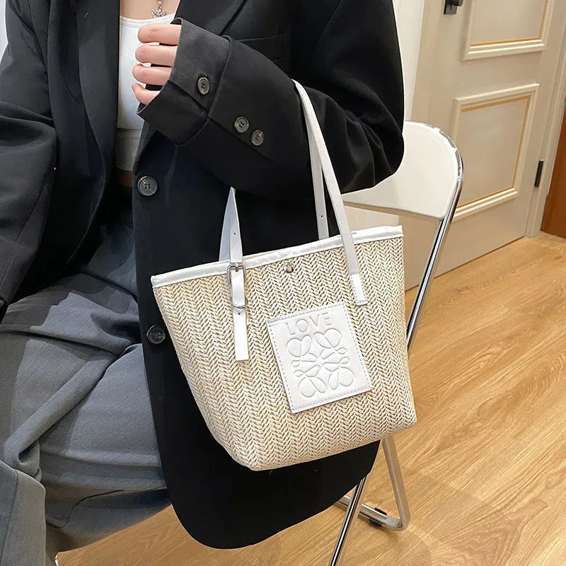 Straw woven women's shoulder bag in white or black with large capacity and retro sewing thread details