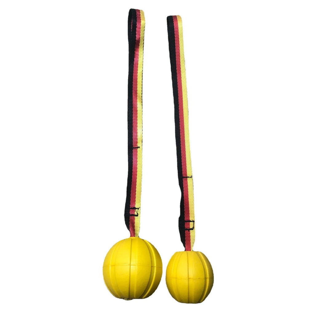 A floating EVA foam dog tetherball with a string attached, shown in camouflage colour next to a yellow one.