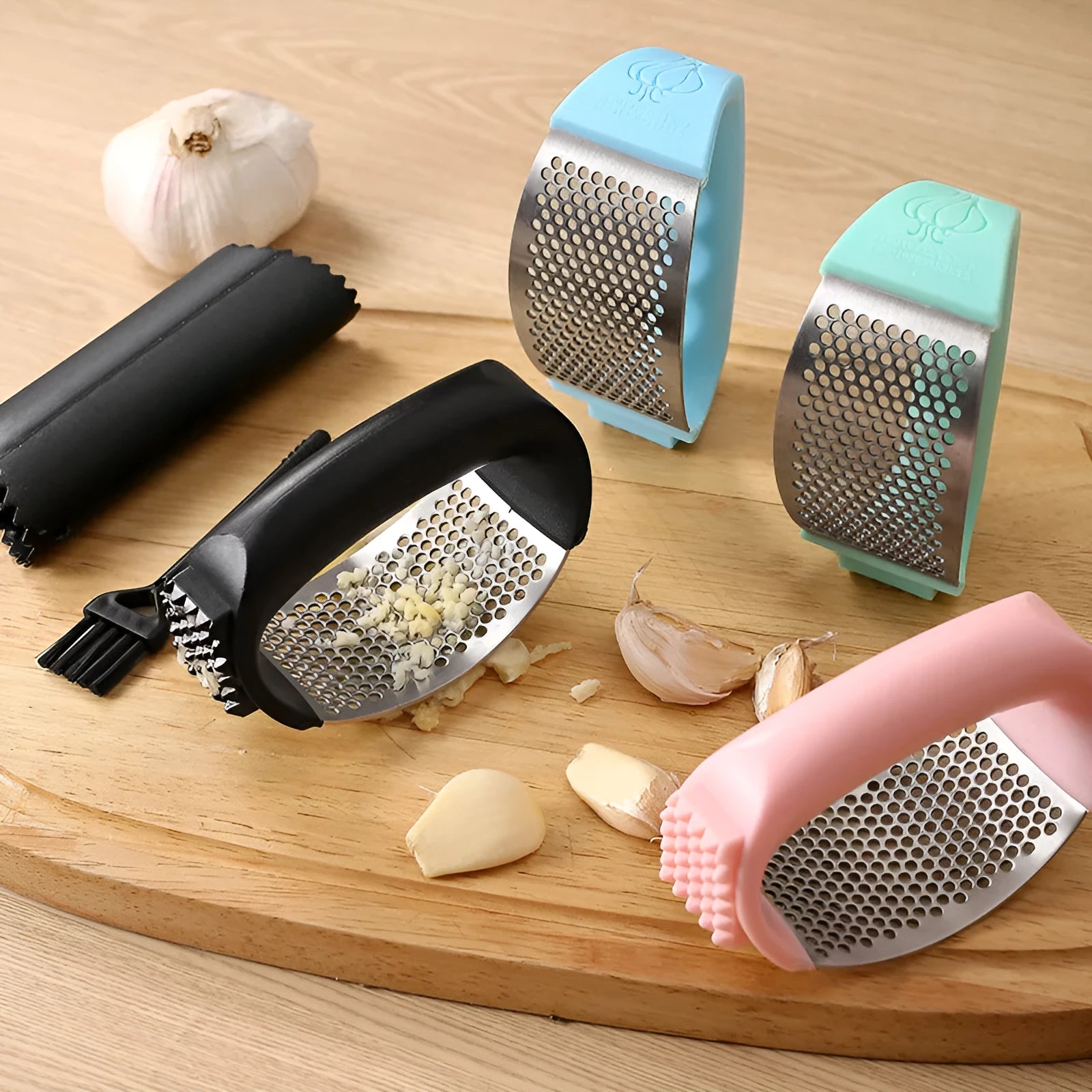 304 stainless steel garlic press 11x7cm in modern simple design on a kitchen counter