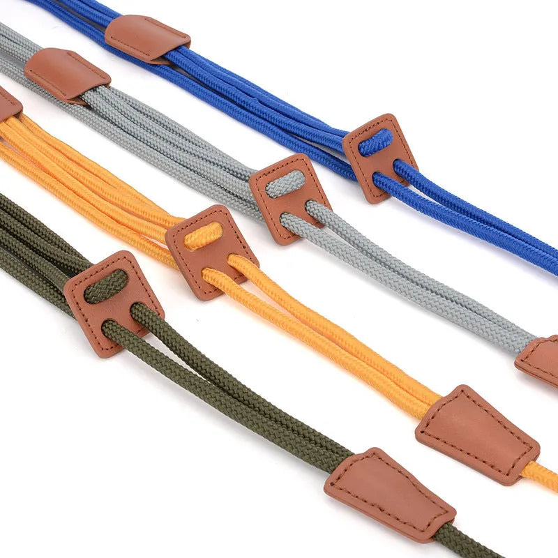 Chest-back dog leash in synthetic silk nylon and cowhide, 143cm long, six monochrome colours available