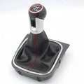 Leather gear shift knob with black dust boot for Volkswagen Golf manual transmission.